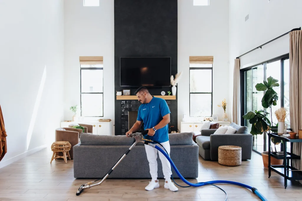 Carpet Cleaning Services in Phoenix, AZ removing dark traffic lanes from a bright living room carpet