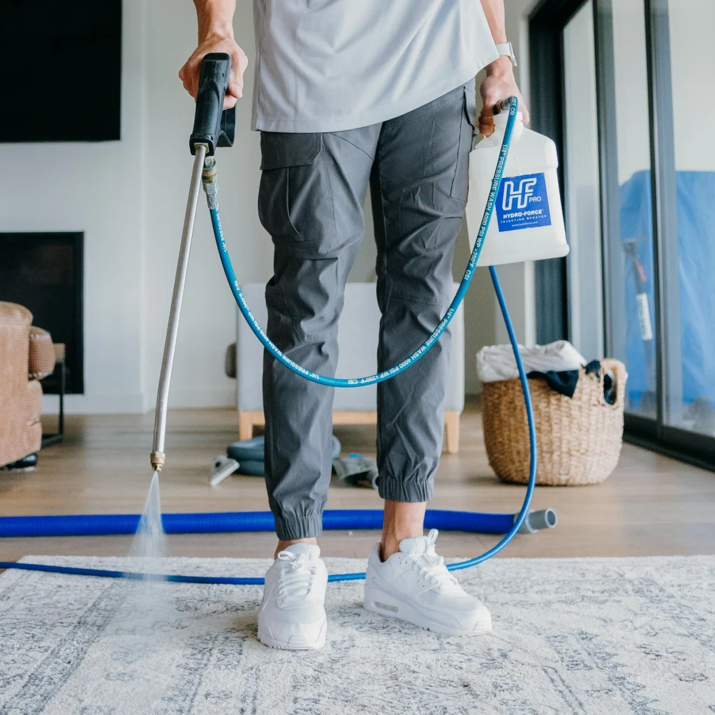 Coconut Cleaning Technician spraying Surfactant