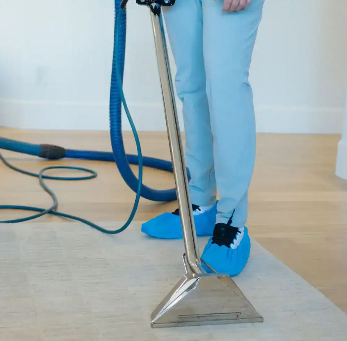 Close up of a Coconut Cleaning extraction wand lifting dirt from carpet fibers