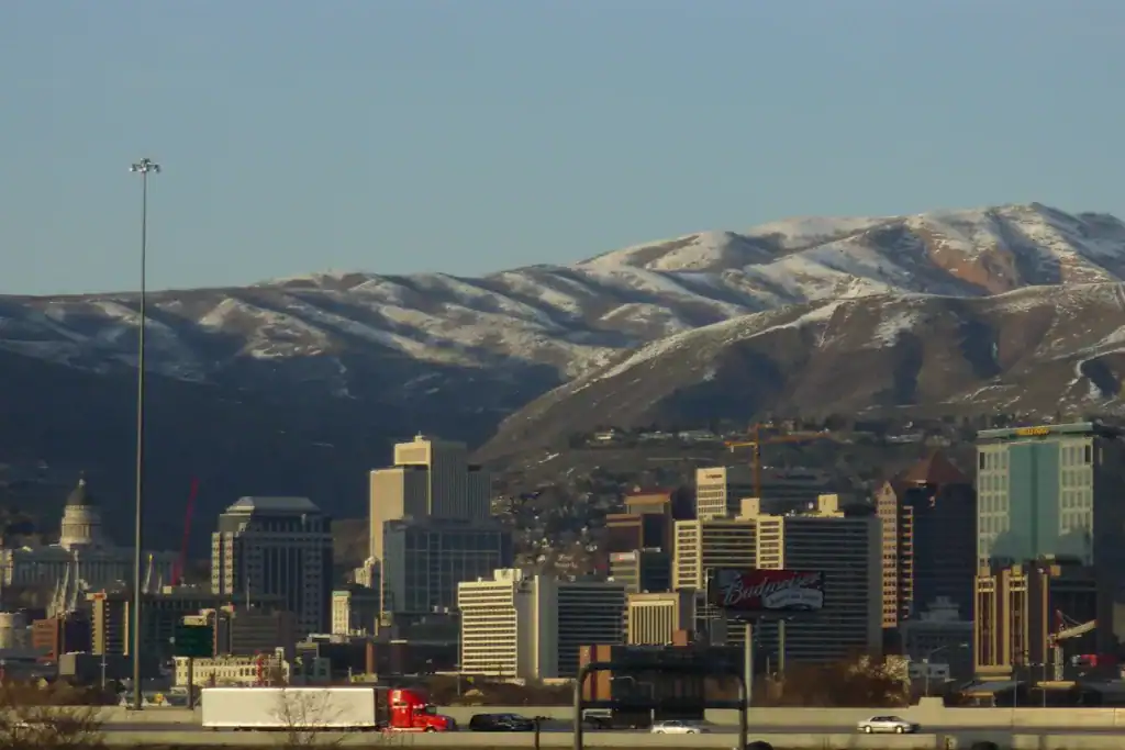 Coconut Cleaning Service Area - Utah Salt Lake City skyline with the snow-capped Wasatch Mountains, Utah
